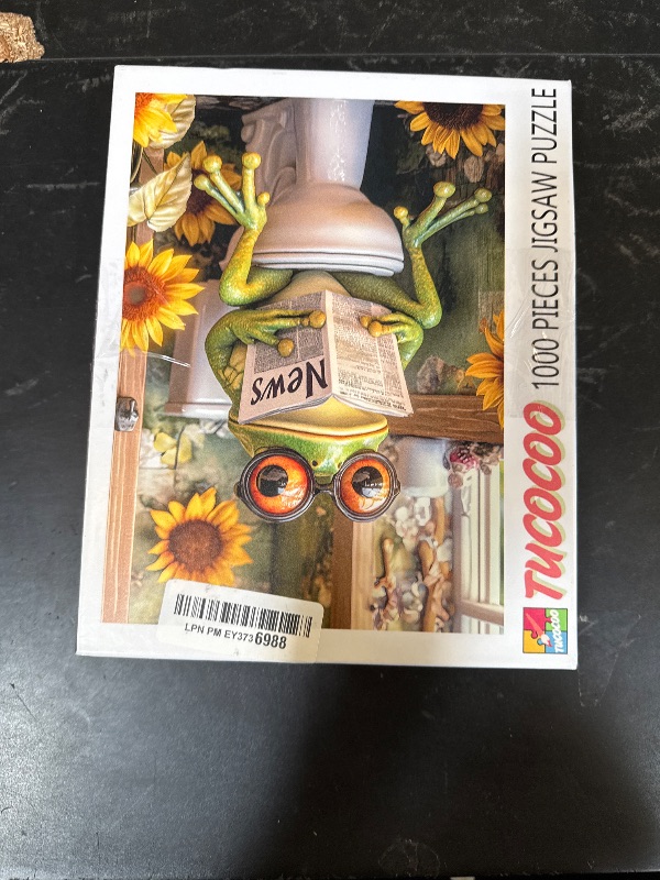 Photo 1 of Funny Frog on Toilet 1000 Piece Puzzle for Adults Big Eyed Frog Reading Newspaper Jigsaw Bathroom Decor with Sunflowers Whimsical Animal Puzzles for Men Women Family Challenging Unique Puzzle Gift