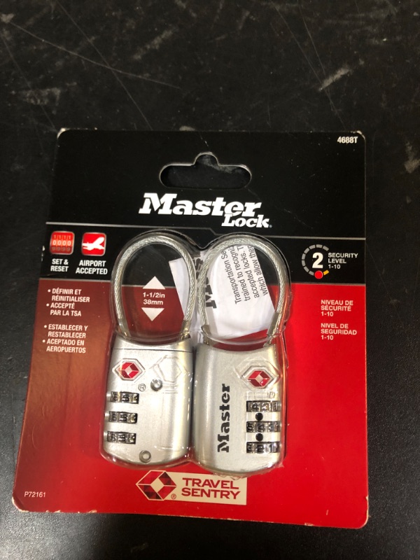 Photo 1 of Master Lock Padlock, Set Your Own Combination TSA Locks for Luggage, Travel Zipper Lock with Cable Shackle is 1-3/16 in. Wide, Colors May Vary, 4688T, 2 Count (Pack of 1)