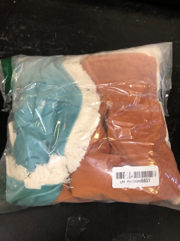 Photo 1 of MONDAY MOOSE Decorative Throw Pillow Covers, Set of 4 Soft Velvet Modern Fringe Tassel Designs, Mix and Match for Home Decor, Pillow Inserts Not Included (18x18 inch, Orange/Teal Blue)