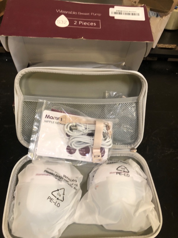 Photo 1 of Mammanuwa Electric Breast Pump - Lightweight, Portable, & Hands-Free with Baby Mouth Technology - BPA-Free, 4 Modes, 9 Levels - Elevate Your Breastfeeding Style with Mammanuwa S32