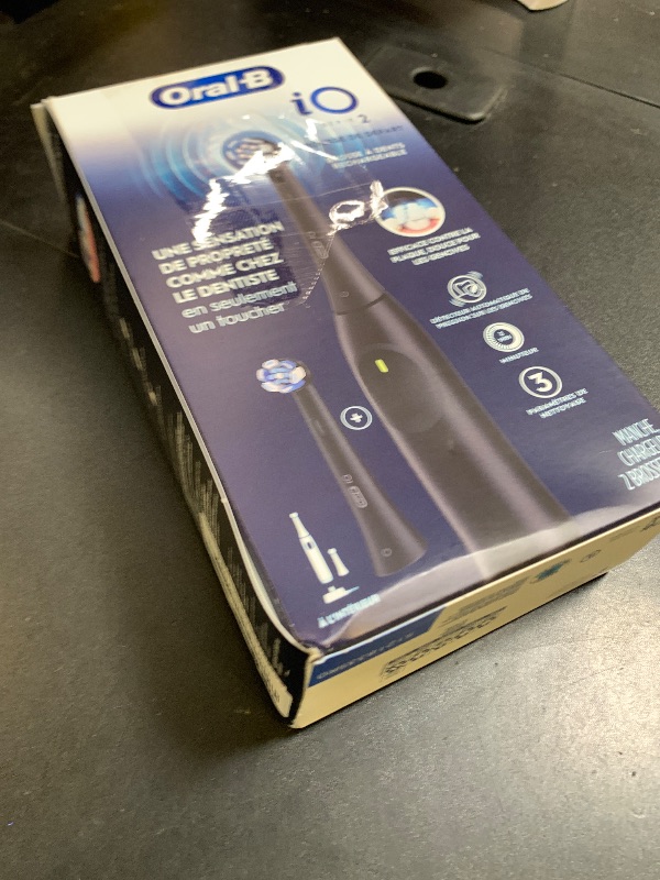 Photo 1 of Oral-B iO Series 2 Rechargeable Electric Powered Toothbrush Starter Kit, Night Black with 2 Brush Heads - Automatic Pressure Sensor to Protect Gums - 3 Modes - 2 Min Timer