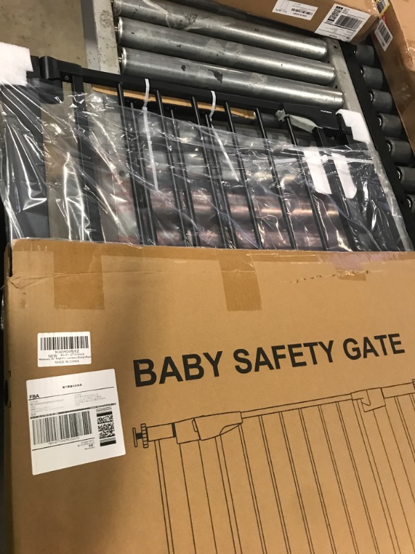 Photo 1 of Mumeasy 36" High Extra Tall Dog Gate, 29.6"-40.5" Wide Pressure Mounted Tall Baby Gate for Dog, Auto Close Pet Gate with Door for Stairs,Doorways,House,Black