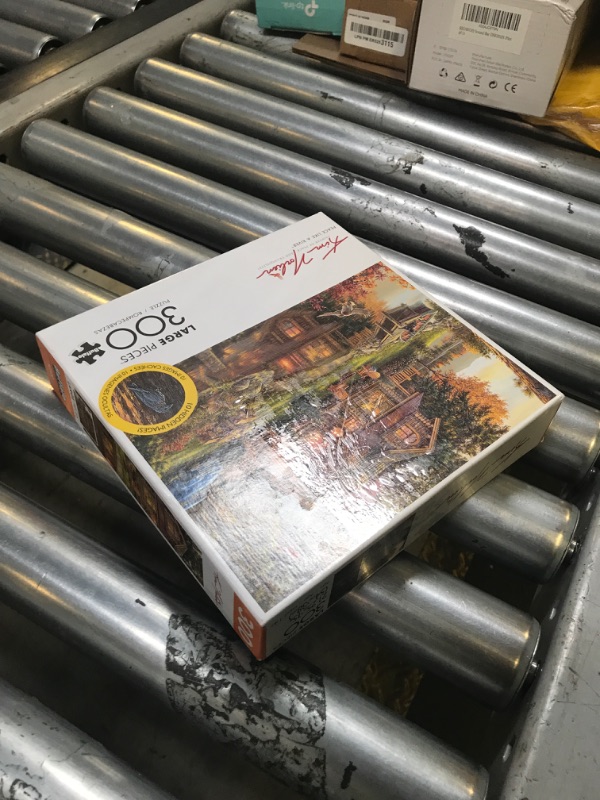 Photo 1 of Buffalo Games - Kim Norlien- Peace Like A River - 300 Piece Jigsaw Puzzle For Adults -Challenging Puzzle Perfect for Game Nights - Finished Size is 21.25 x 15.00