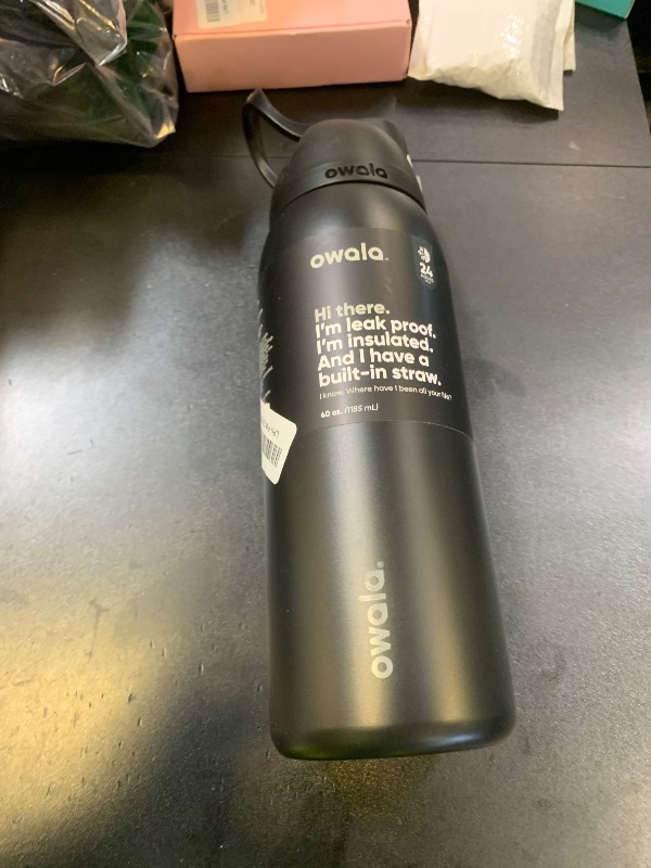 Photo 1 of Owala FreeSip Insulated Stainless Steel Water Bottle with Straw, BPA-Free Sports Water Bottle, Great for Travel, 40 Oz, Very, Very Dark