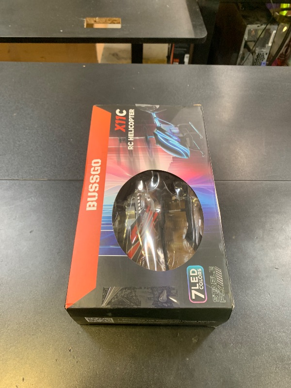 Photo 1 of BUSSGO RC Helicopter, Remote Control Helicopter for Kids with 30Mins Flight(2 Batteries), 7+1 LED Light Modes, Altitude Hold, RC Toys for Boys Girls