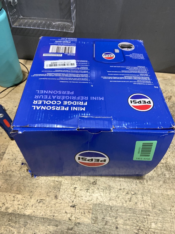 Photo 1 of ***FOR PARTS ONLY/ NON-FUNCTIONAL*** CURTIS Pepsi 6-can Mini Fridge, BLUE, 4 liters