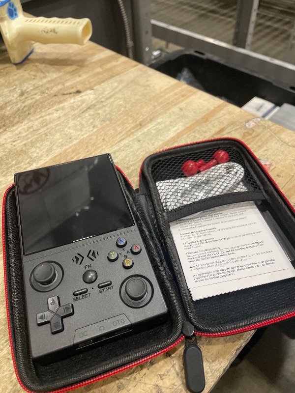 Photo 1 of **ONLY FUNCTIONAL WHEN CONSISTENLY PLUGGED IN HAS BAD BATTERY*** UYTGXEN XF40V Retro Handheld Game Console with 2*Detachable Long Joysticks, 4.0-Inch HD IPS Screen Retro Gaming Console, Preloaded Classic Games with Multiple Emulator, Pocket Video Gaming
