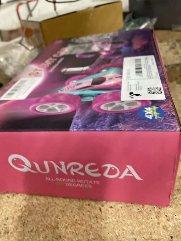 Photo 1 of ** MISSING PARTS** QUNREDA RC Cars, Pink Remote Control Car for Girls, 2.4 GHZ Double Sided RC Stunt Car 360° Rotating Remote Control Crawler with Headlights Car Toys for 6 7 8 9 10 11 12 Girls Birthday Gift Grandkids