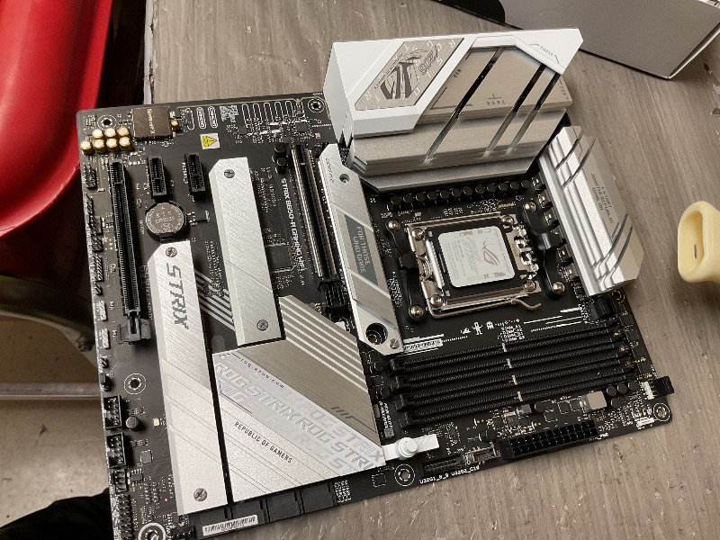 Photo 1 of ASUS ROG Strix B650-A Gaming WiFi AMD B650 AM5 Ryzen™ Desktop 9000 8000 & 7000 ATX motherboard, 12 + 2 power stages, DDR5, 3x M.2 slot, PCIe® 4.0, 2.5G LAN, WiFi 6E, USB 3.2 Gen 2x2 Type-C®, Aura Sync