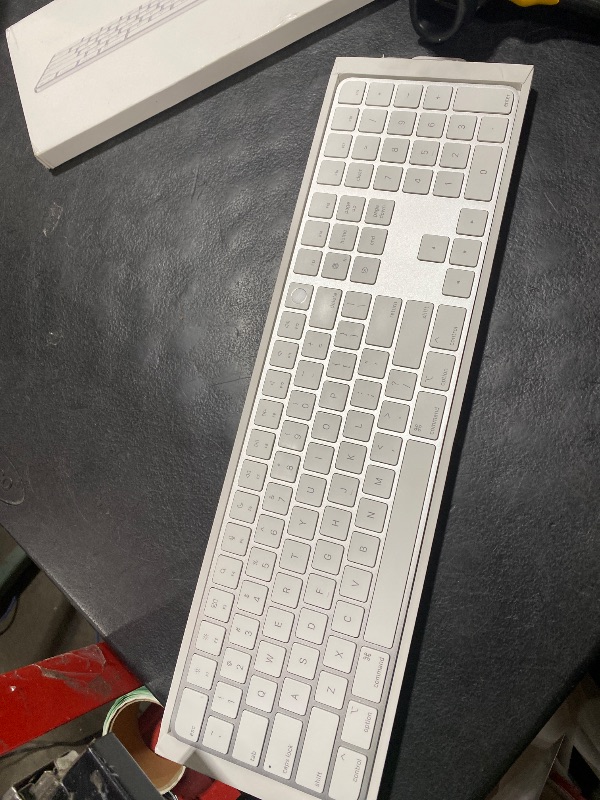 Photo 1 of Apple Magic Keyboard with Touch ID and Numeric Keypad: Wireless, Bluetooth, Rechargeable. Works with Mac Computers with Apple Silicon; US English - White Keys