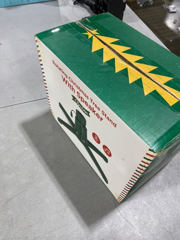 Photo 1 of ?Patent Pending? Musical Rotating Christmas Tree Stand, UL Certified Up to 9ft 120 lb Artificial Christmas Tree with Speaker, Spinning Stand with Remote, Fit for 1.25-2" in Tree Poles - 800W