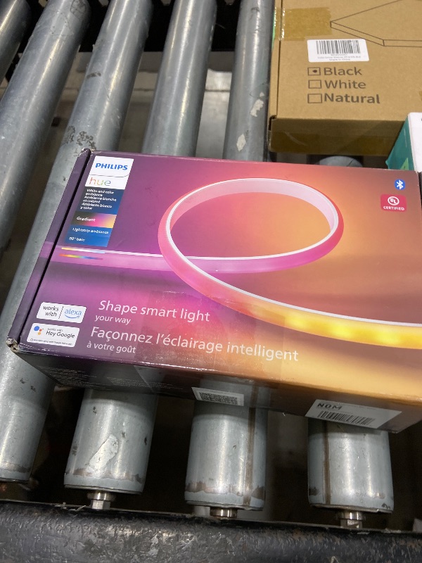 Photo 1 of Philips Hue Indoor 6-Foot Smart LED Light Strip Base Kit with Plug - Flowing Multicolor Effect - 1 Pack - Control with Hue App - Works with Alexa, Google Assistant and Apple HomeKit