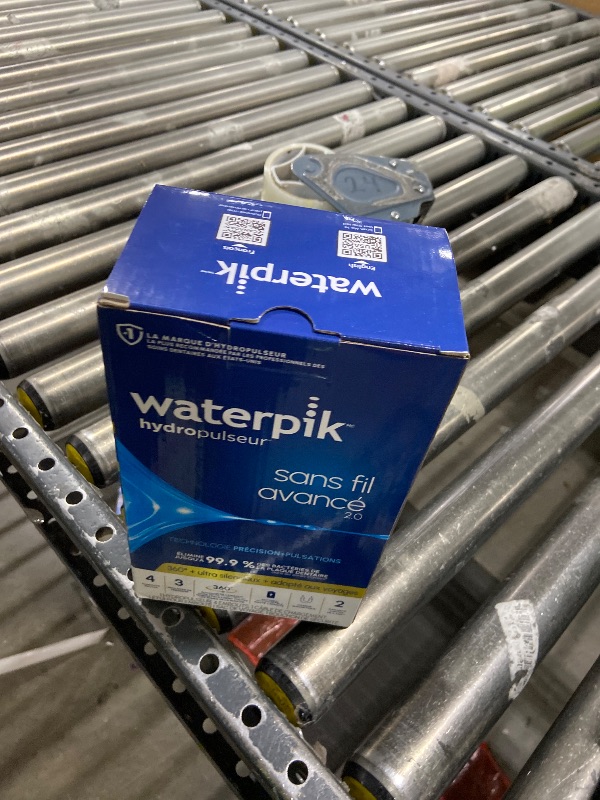 Photo 1 of Waterpik Cordless Advanced 2.0 Water Flosser For Teeth, Gums, Braces, Dental Care With Travel Bag and 4 Tips, ADA Accepted, Rechargeable, Portable, and Waterproof, Black WP-582, Packaging May Vary