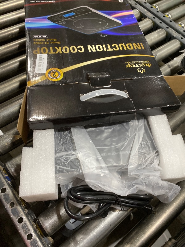 Photo 1 of Duxtop Portable Induction Cooktop Burner, Induction Hot Plate with LCD Sensor Touch 1800 Watts, Silver 9600LS/BT-200DZ