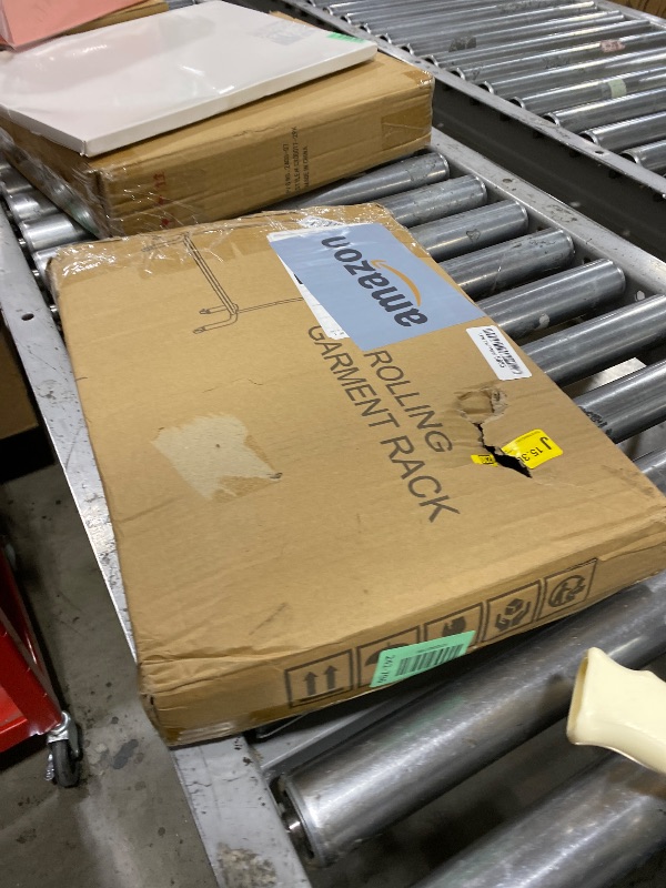 Photo 1 of JIUYOTREE Metal Clothing Rack with Wheels, 43.3 Inches Rolling Clothes Garment Coat Rack with Bottom Shelf, Clothing Rack for Hanging Clothes, Coats, Skirts, Shirts, Sweaters, Black