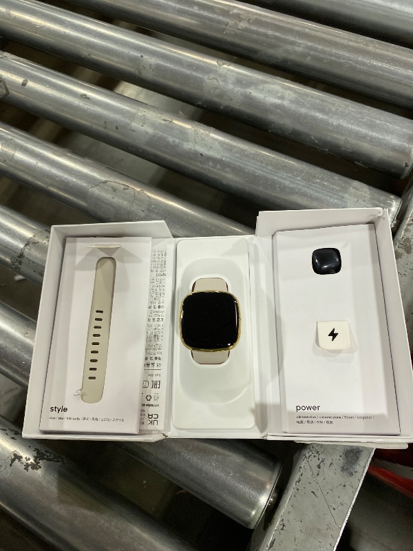 Photo 1 of Fitbit Sense Advanced Smartwatch with Tools for Heart Health, Stress Management & Skin Temperature Trends, White/Gold, One Size (S & L Bands Included)