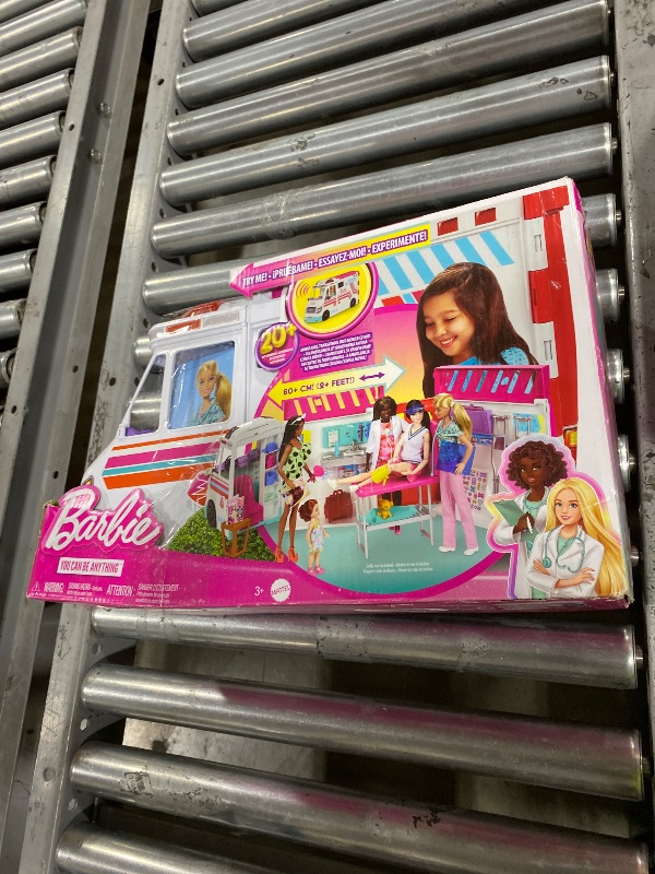 Photo 1 of ???Barbie Playset with 20+ Accessories, Emergency Vehi??cle Transforms into 2+ Foot Hospital with Lights and Sounds, Care Clinic????????