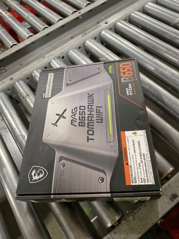 Photo 1 of MSI MAG B650 Tomahawk WiFi Gaming Motherboard (AMD Ryzen 9000/8000/7000 Series Processors, AM5, DDR5, PCIe 4.0, M.2, SATA 6Gb/s, USB 3.2 Gen 2, HDMI/DP, Wi-Fi 6E, Bluetooth 5.3, 2.5Gbps LAN, ATX)