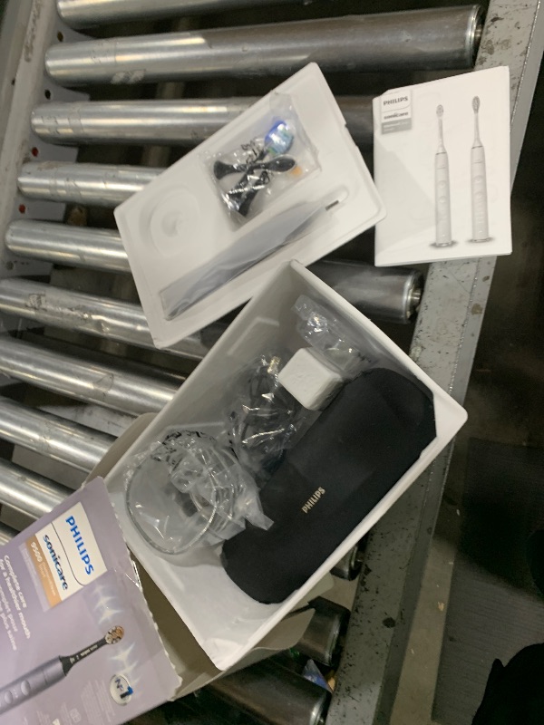 Photo 1 of Philips Sonicare DiamondClean Smart 9500 Electric Toothbrush, Sonic Toothbrush with App, Pressure Sensor, Brush Head Detection, 5 Brushing Modes and 3 Intensity Levels, Grey, Model HX9923/41