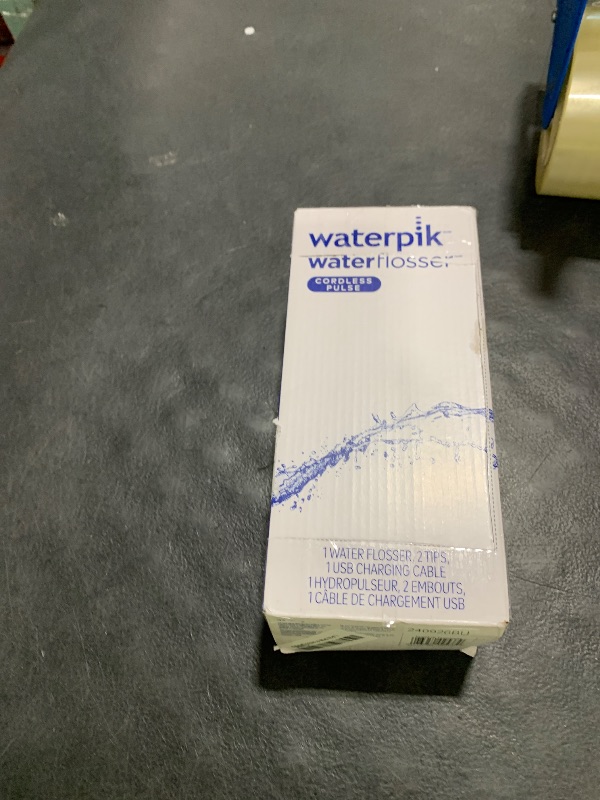Photo 1 of Waterpik Cordless Pulse Rechargeable Portable Water Flosser for Teeth, Gums, Braces Care and Travel with 2 Flossing Tips, Waterproof for Shower, ADA Accepted, WF-20 Blue, Packaging and Tips May Vary