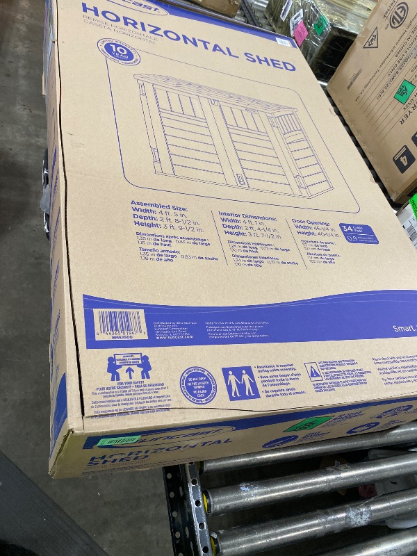 Photo 1 of Suncast 34 Cu Ft Horizontal Resin Plastic Storage Shed - Outdoor Storage Shed with Floor Included, Lockable, Weatherproof, Fits Small to Medium Trash Cans, Generators, & Garden Tools, Vanilla Stoney