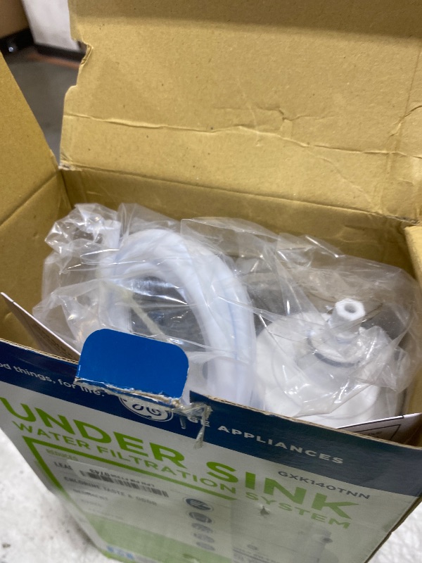 Photo 1 of GE Single Stage Under Sink Water Filtration System, Reduces 95+ Impurities Including Lead, Chlorine, Arsenic, & PFOA/PFOS, Easy Installation with Included Kit, Twist & Lock Design, GXK140TNN