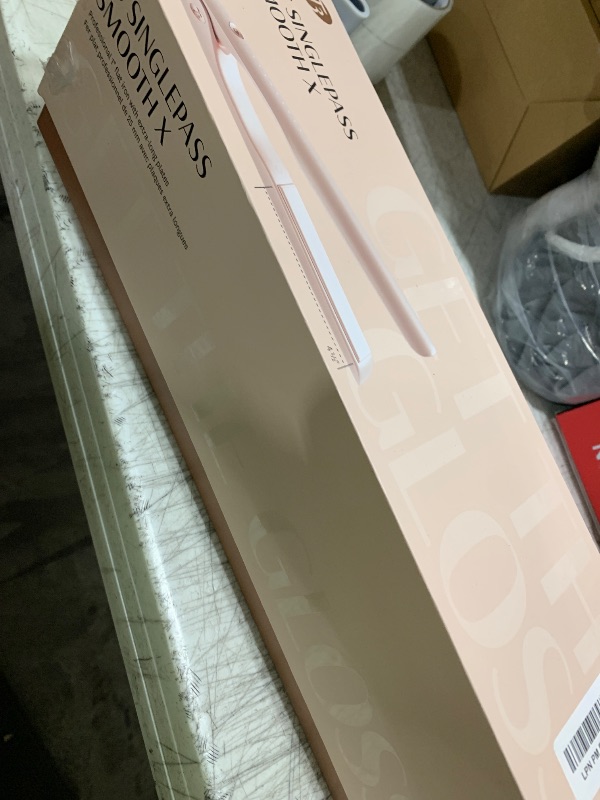 Photo 1 of T3 SinglePass Smooth X Professional Flat Iron with Extra-Long Ceramic Plates for Faster Styling, 9 Heat Settings for All Hair Types, For Straightening, Curling, and Waving