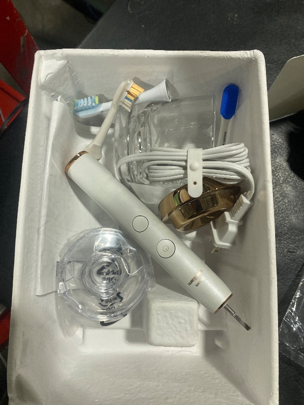 Photo 1 of Philips Sonicare DiamondClean Smart 9500 Electric Toothbrush, Sonic Toothbrush with App, Pressure Sensor, Brush Head Detection, 5 Brushing Modes and 3 Intensity Levels, Rosegold, Model HX9923/61