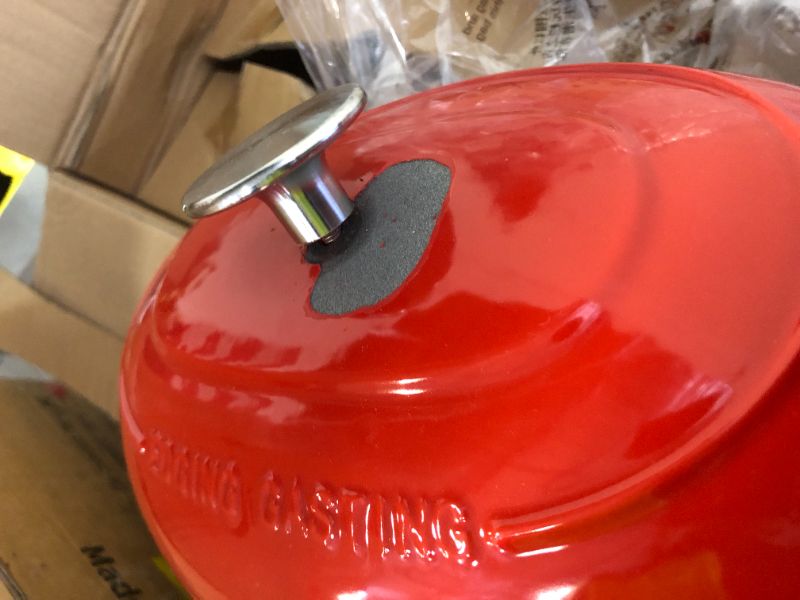 Photo 1 of **LID CHIPPED, SEE PHOTOS** Cast iron 6QT cooking pot - Gradient red - Includes two silicone gloves - Enamel pot
