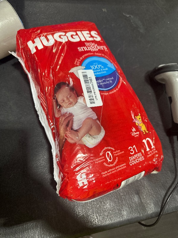 Photo 1 of Huggies Size Newborn Diapers, Little Snugglers Baby Diapers, Size Newborn (up to 10 lbs), 31 Count, Packaging May Vary