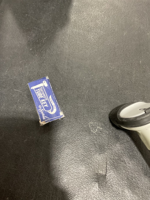 Photo 1 of Dr. Sheffield's Aluminum Tube Key I Designed to effortlessly roll up Your Toothpaste Tubes, ensuring You Never Waste a Single Drop.
