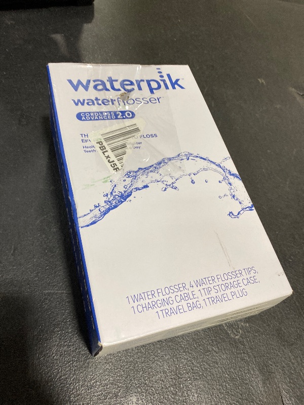 Photo 1 of Waterpik Cordless Advanced 2.0 Water Flosser For Teeth, Gums, Braces, Dental Care With Travel Bag and 4 Tips, ADA Accepted, Rechargeable, Portable, and Waterproof, White WP-580, Packaging May Vary