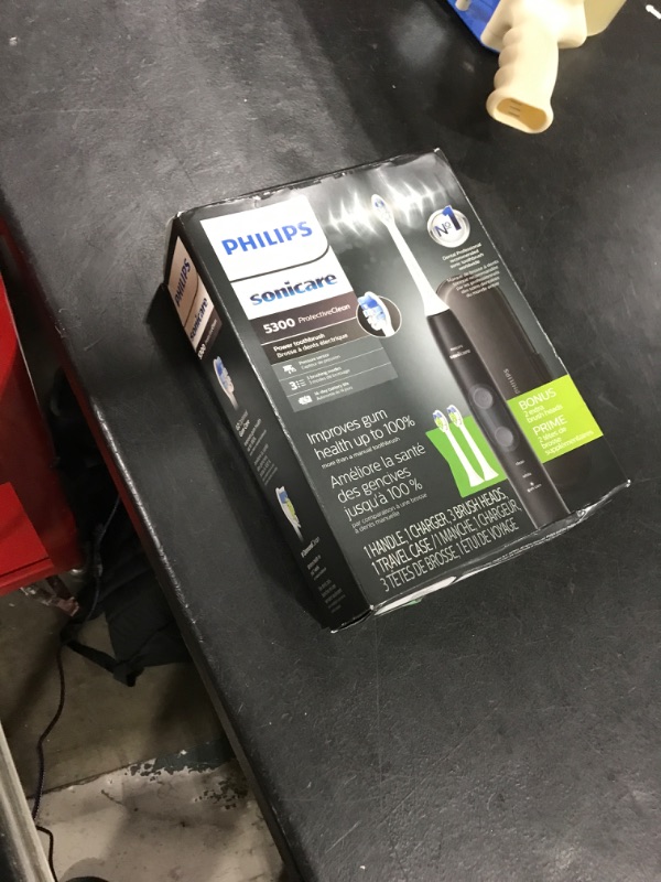 Photo 1 of Philips Sonicare ProtectiveClean 5300 Rechargeable Electric Toothbrush, with Pressure Sensor, 3 Cleaning Modes, SmarTimer and QuadPacer, with 2 Bonus Brush Heads, Travel Case, Black, Model HX6423/34