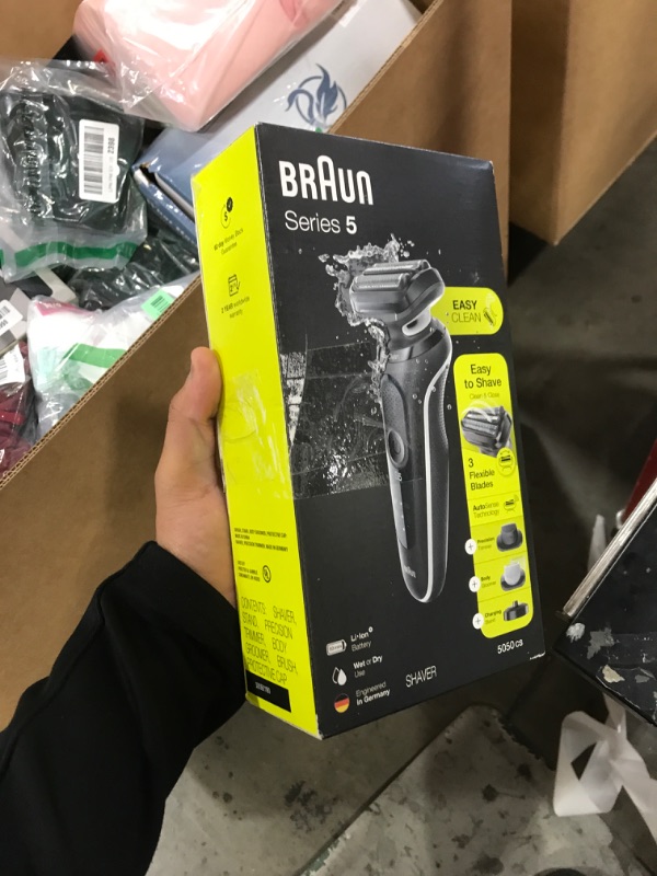 Photo 1 of Braun Electric Razor for Men, Waterproof Foil Shaver, Series 5 5050cs, Wet & Dry Shave, with Beard Trimmer and Body Groomer, Rechargeable, Charging Stand Included, Blue