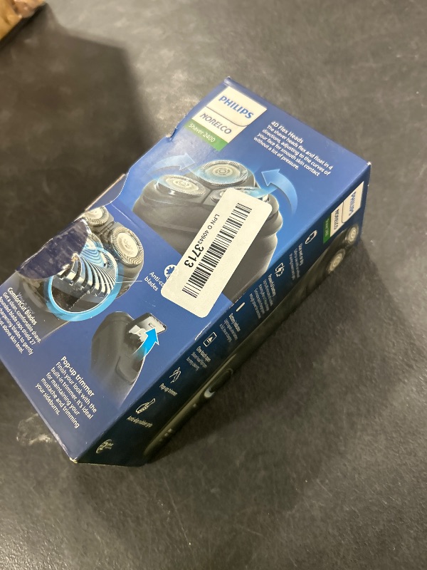Photo 1 of Philips Norelco Shaver 2400 Series, Wet and Dry Electric Shaver, Pop-up Trimmer, P-Cap, Deep Black, Model X3001/90