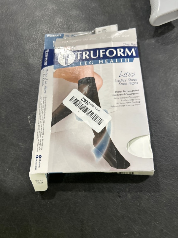 Photo 1 of Truform Sheer Compression Stockings, 15-20 mmHg, Women's Knee High Length, 20 Denier, Light Beige, Small
