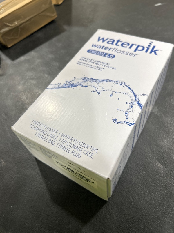 Photo 1 of Waterpik Cordless Advanced 2.0 Water Flosser For Teeth, Gums, Braces, Dental Care With Travel Bag and 4 Tips, ADA Accepted, Rechargeable, Portable, and Waterproof, White WP-580, Packaging May Vary