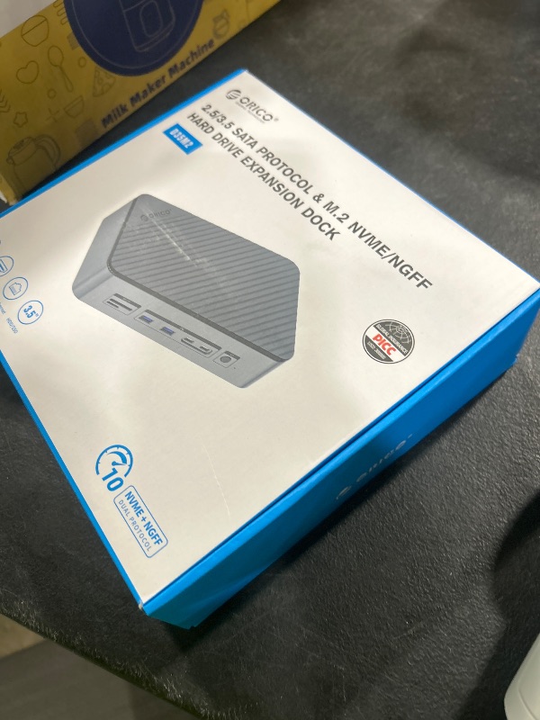Photo 1 of ORICO 12-in-1 Docking Station with Dual Slot SSD Enclosure, Supports M.2 NVMe & SATA SSD, 2.5/3.5" SATA SSD/HDD, 10Gbps, 4K@60Hz HDMI, 100W PD, Card Reader, Ethernet - D35M2