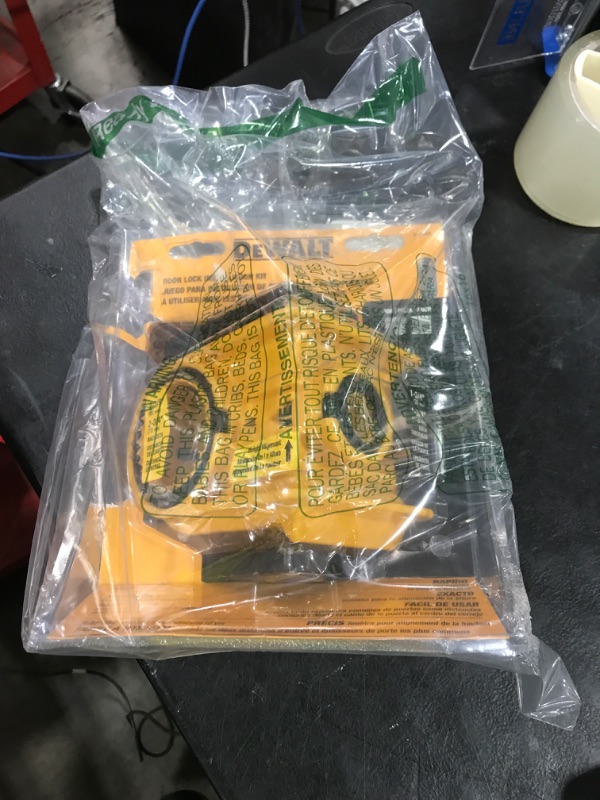 Photo 1 of DEWALT Door Lock Installation Kit, C-Clamp Design, For Metal or Wood Doors, 2 Adjustable Bushings, Easy Installation (D180004)
