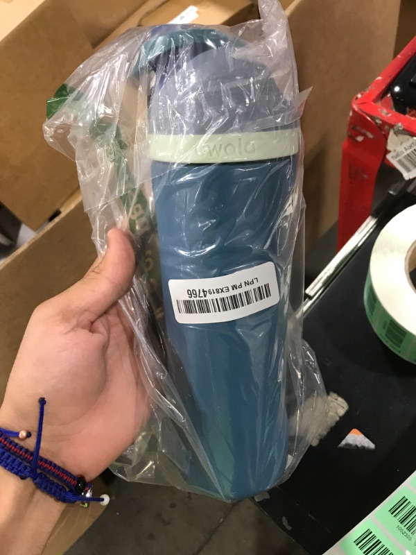 Photo 1 of Owala FreeSip Insulated Stainless Steel Water Bottle with Straw, BPA-Free Sports Water Bottle, Great for Travel, 24 Oz, Denim