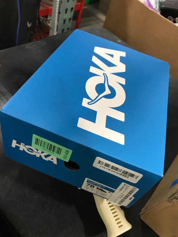 Photo 1 of Hoka Women's Clifton 10 Sneaker, Black/Rose Gold, 7