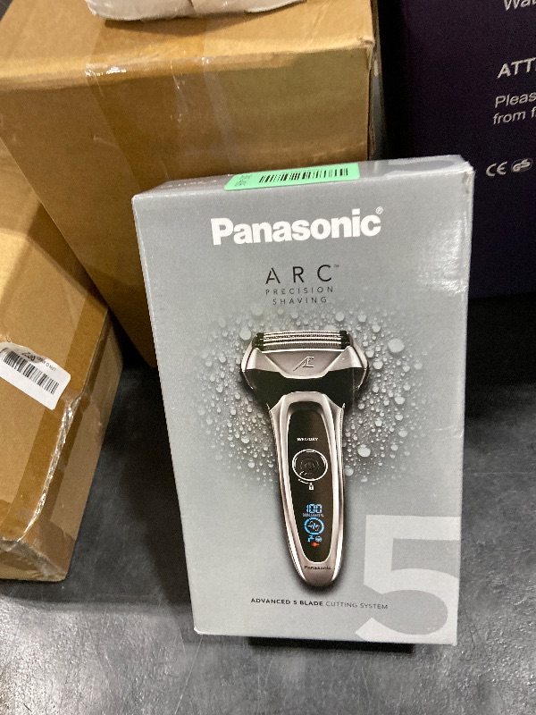 Photo 1 of Panasonic ARC5 Electric Razor for Men with Pop-Up Trimmer, Wet/Dry 5-Blade Electric Shaver with Intelligent Shave Sensor and Multi-Flex Pivoting Head – ES-LV65-S (Silver)