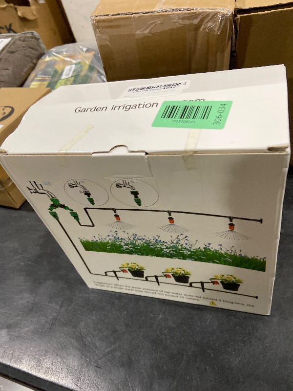 Photo 1 of ANSIKE Drip Irrigation System - Irrigation System for Garden w/ 1/4" & 1/2" Fast-Lock Tubing - Adjustable Nozzles & Sprinklers Garden Watering System(164FT Kits)