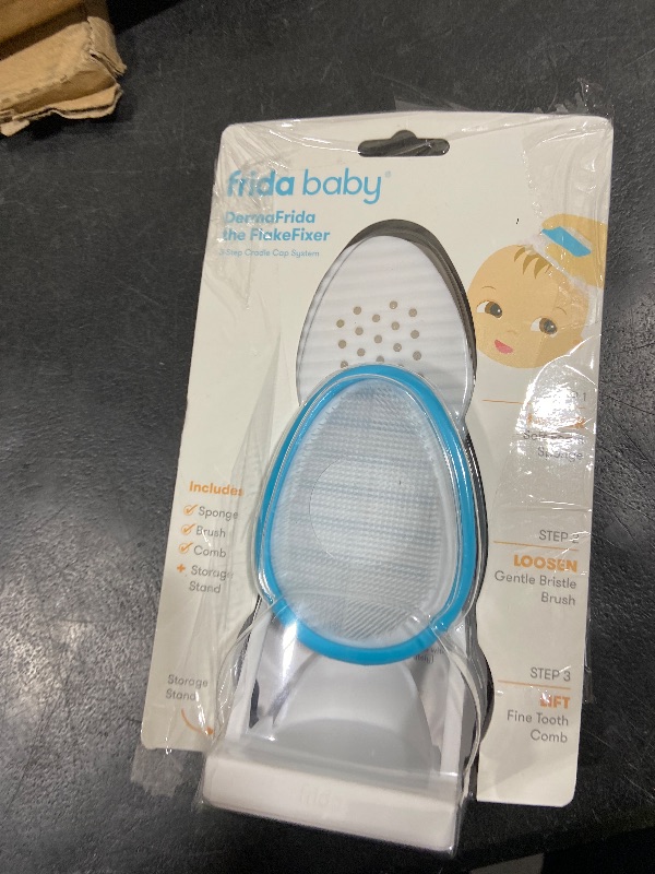 Photo 1 of Frida Baby The 3-Step Cradle Cap System, DermaFrida The FlakeFixer, Sponge, Brush, Comb and Storage Stand for Babies with Cradle Cap, White-Blue
