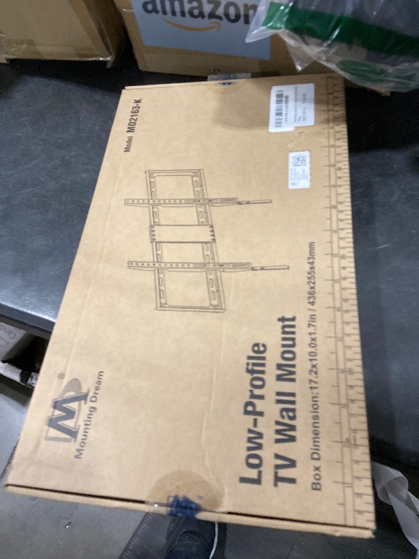 Photo 1 of Mounting Dream TV Mount Fixed for Most 42-84 Inch Flat Screen TVs, TV Wall Mount Bracket up to VESA 600 x 400mm and 132 lbs - Fits 16"/18"/24" Studs - Low Profile and Space Saving MD2163-K