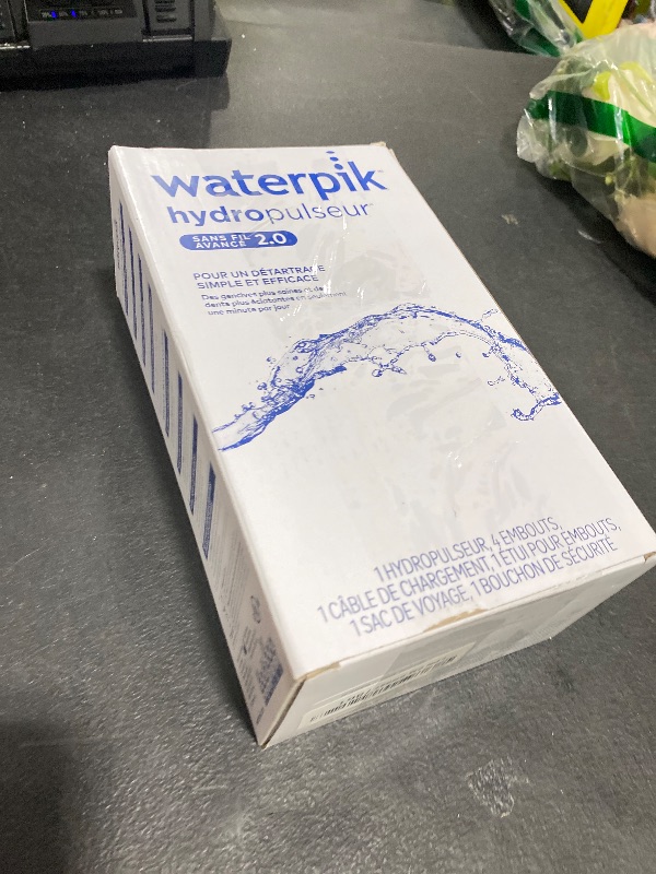 Photo 1 of Waterpik Cordless Advanced 2.0 Water Flosser For Teeth, Gums, Braces, Dental Care With Travel Bag and 4 Tips, ADA Accepted, Rechargeable, Portable, and Waterproof, White WP-580, Packaging May Vary