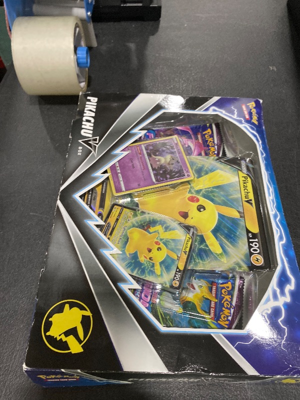 Photo 1 of Pokemon TCG Pikachu V Booster Box - 4 Booster Packs + Promo!