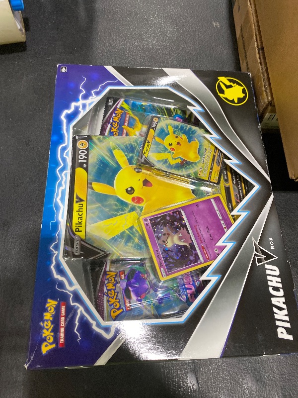 Photo 1 of Pokemon TCG Pikachu V Booster Box - 4 Booster Packs + Promo!