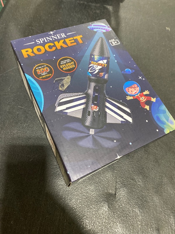 Photo 1 of Rocket Launcher for Kids, Self Launching Motorized Air Rocket Toy, Outdoor Toys for Ages 8-12, Model Rockets with Parachute Safely Land, Spaceship Launch up to 200 ft Birthday Gifts for Boys