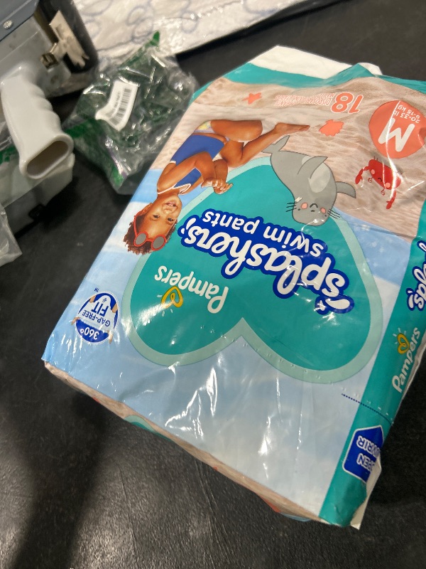 Photo 1 of Pampers Swim Diapers - Splashers - Size 4, 18 Count, Gap-Free Disposable Baby Swimming Pants